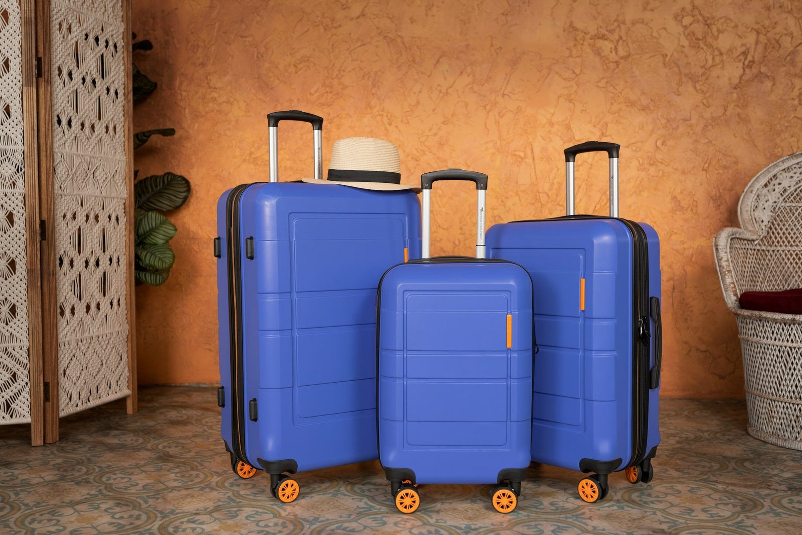 three blue suitcases