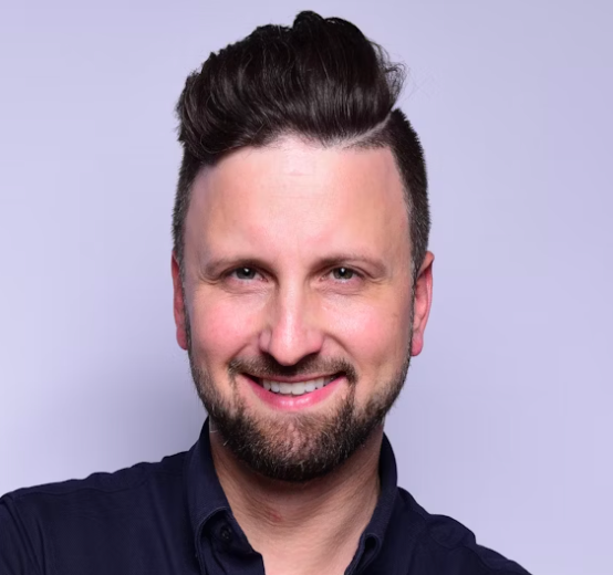 man in a shirt with dark hair